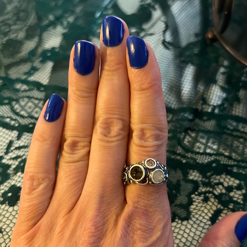 Silver ring with different stones